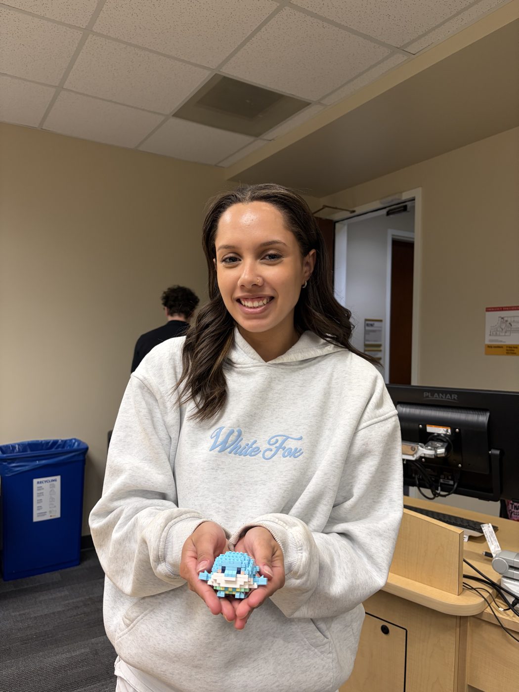 A member smiling at a chapter social